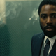 John David Washington is up to some time-twisting business.